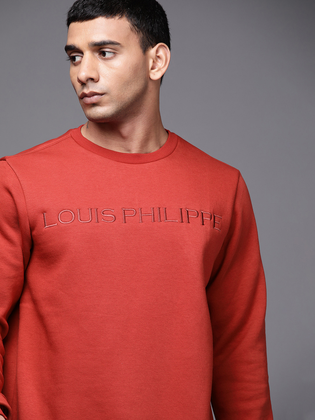 

Louis Philippe Men Rust Orange Brand Logo Printed Sweatshirt