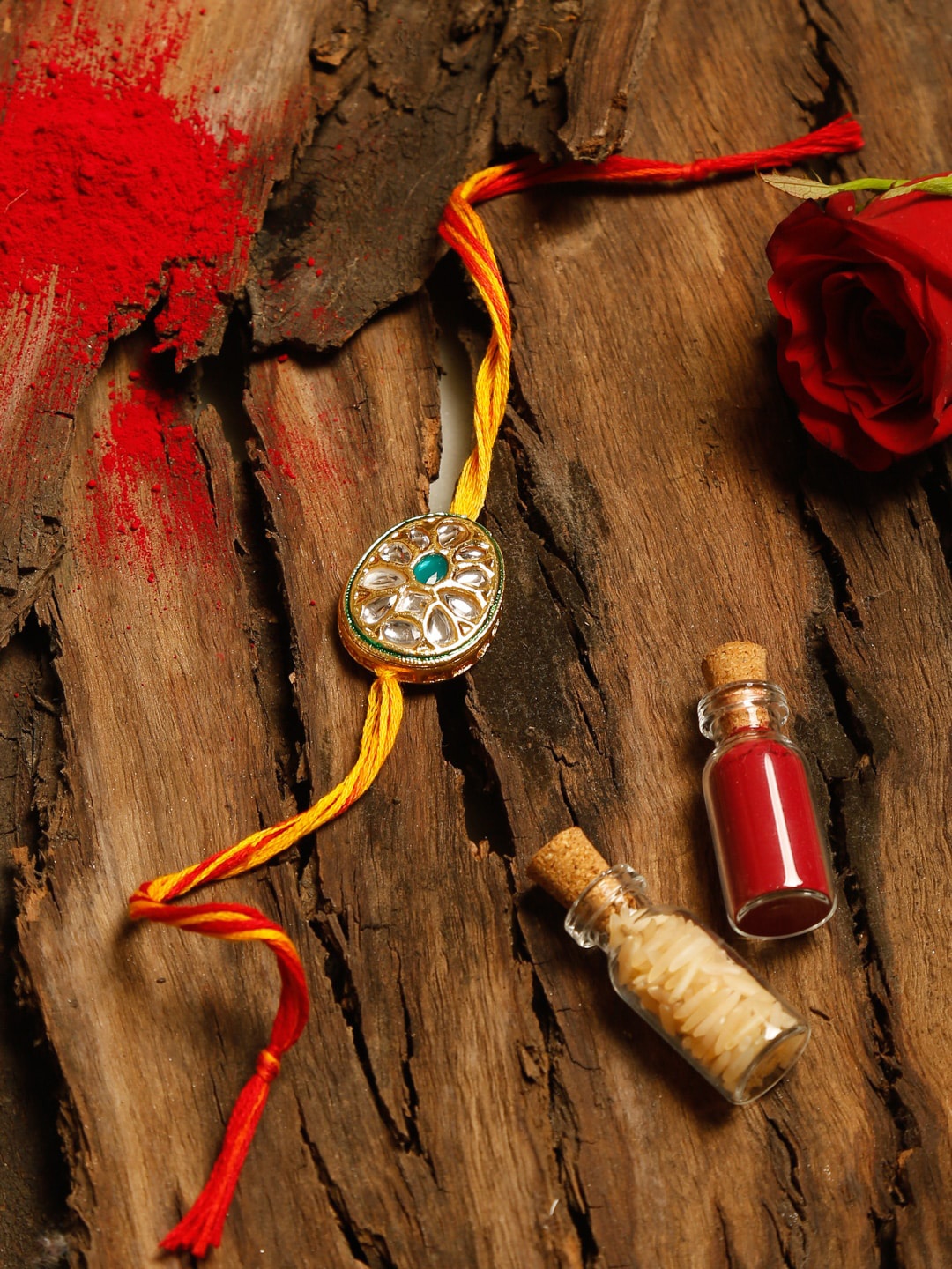 

Ruby Raang Gold & Green Kundan Rakhi Gift Box With Roli, Chawal & Greeting Card