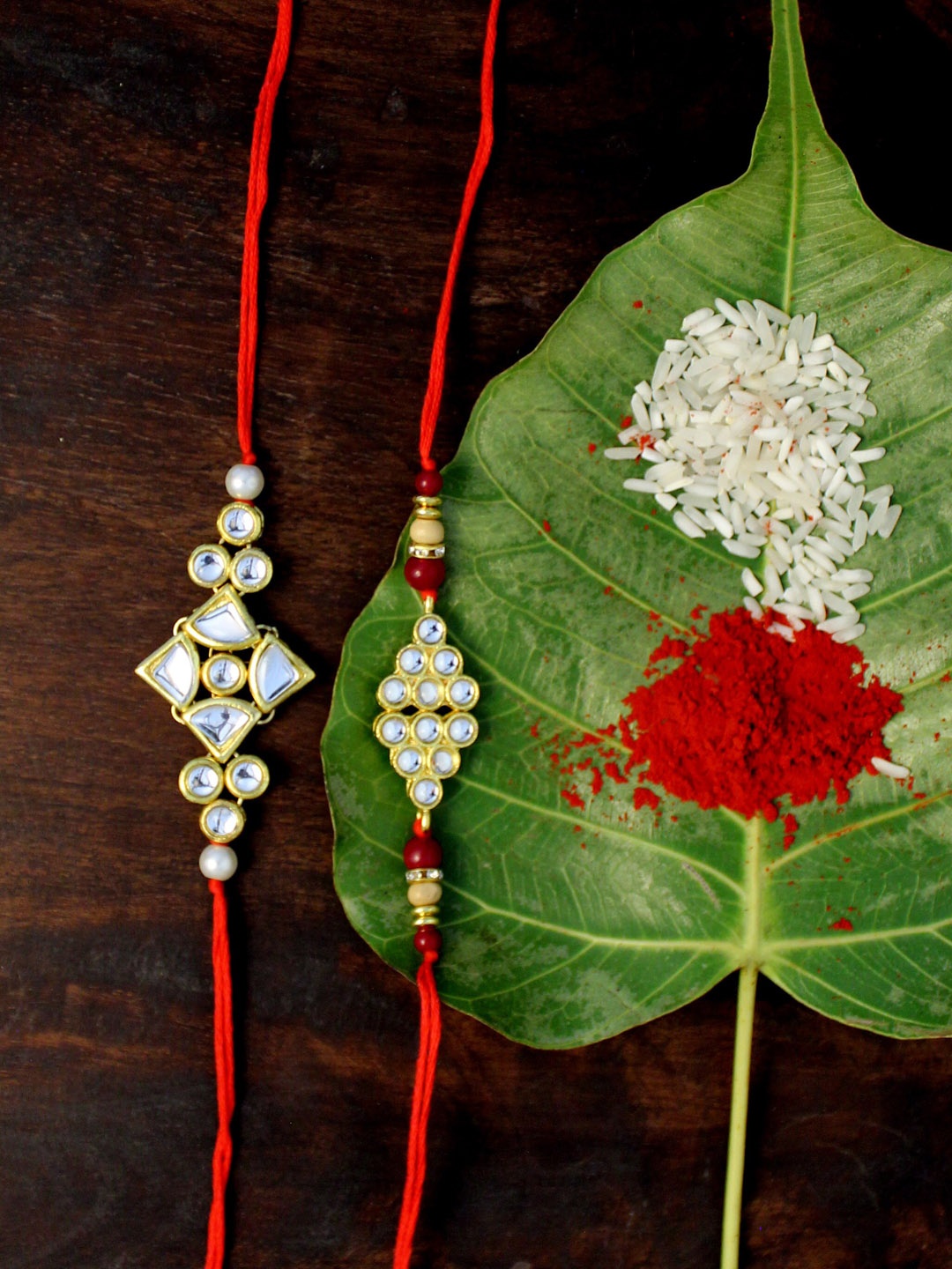 

KARATCART Red & Gold Set of 2 Gold-Plated Kundan Rakhi