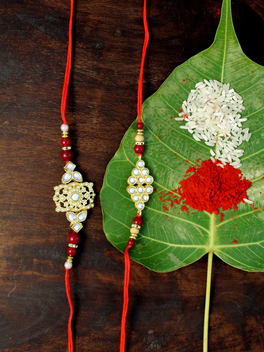 

KARATCART Set of 2 Gold-Plated & Red Kundan Rakhi