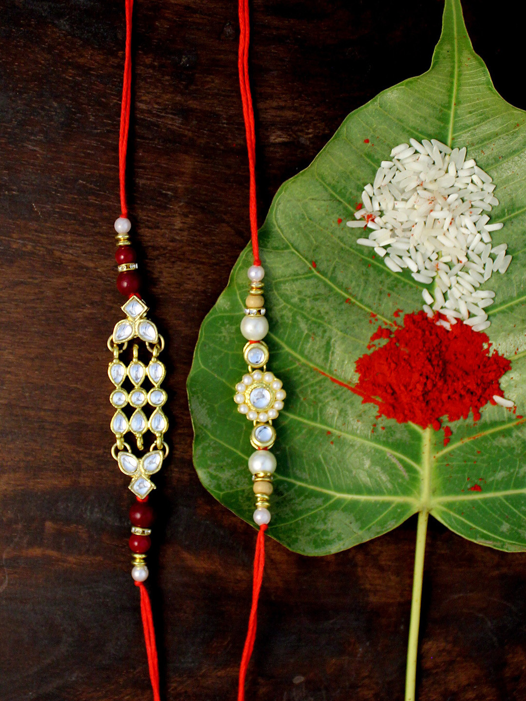 

KARATCART Set of 2 Gold-Plated & Red Kundan Rakhi