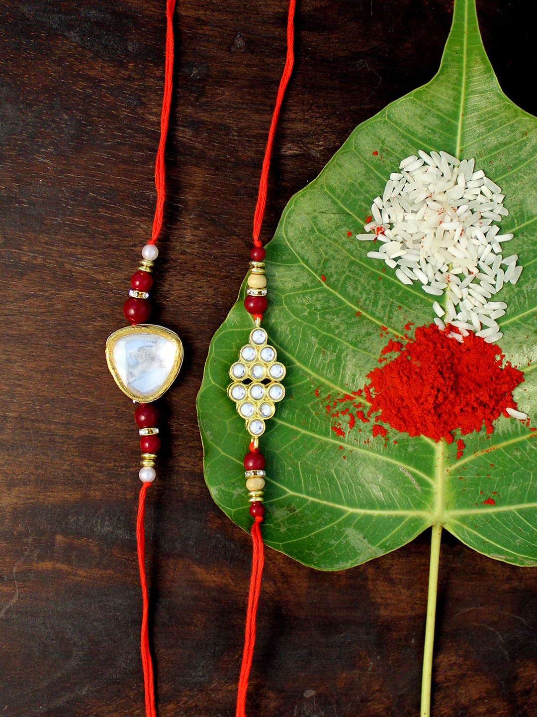 

KARATCART Set of 2 Gold-Plated & Red Kundan Rakhi