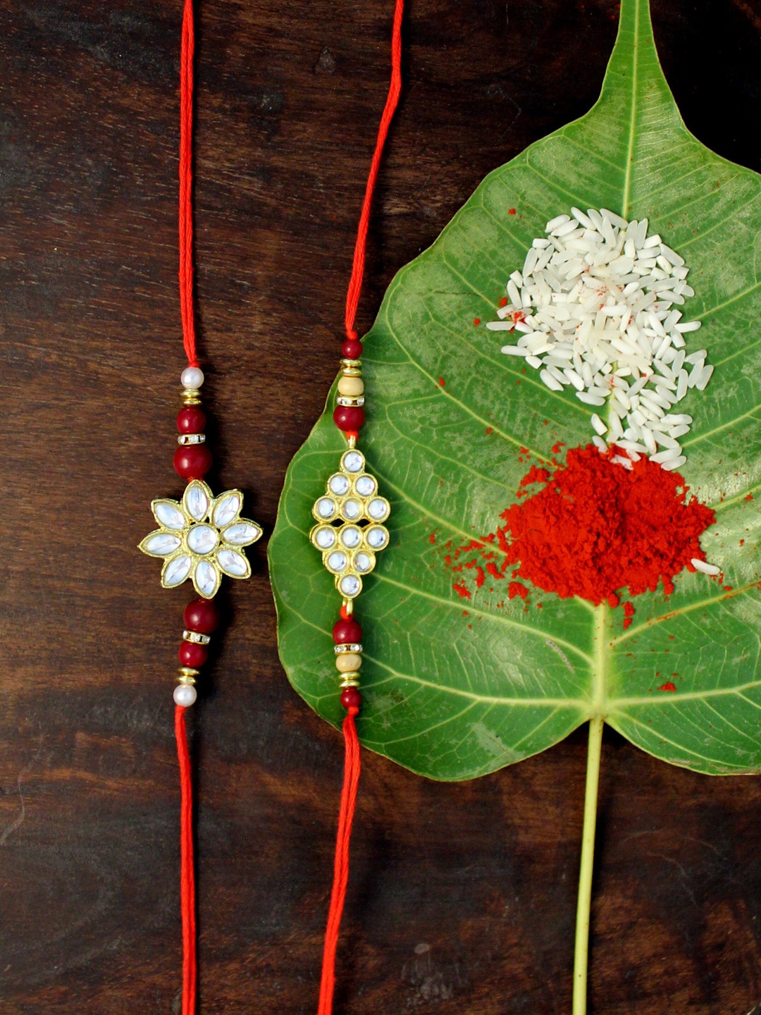 

KARATCART Set of 2 Gold-Plated & Red Kundan Rakhi
