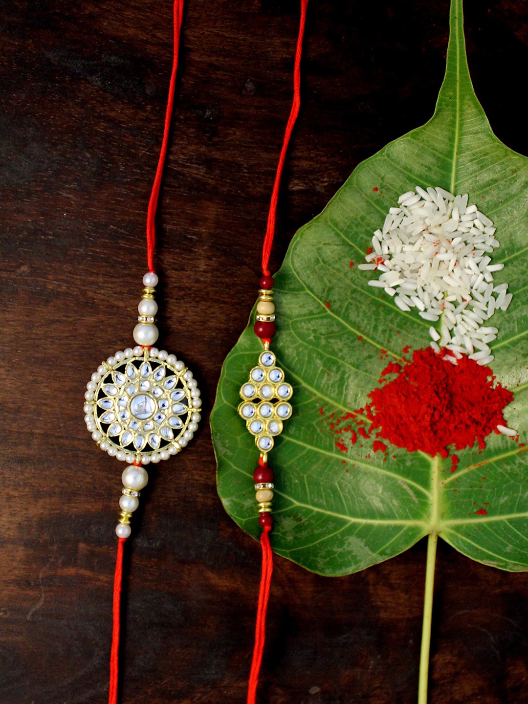

KARATCART Set of 2 Gold-Plated & Red Kundan Rakhi