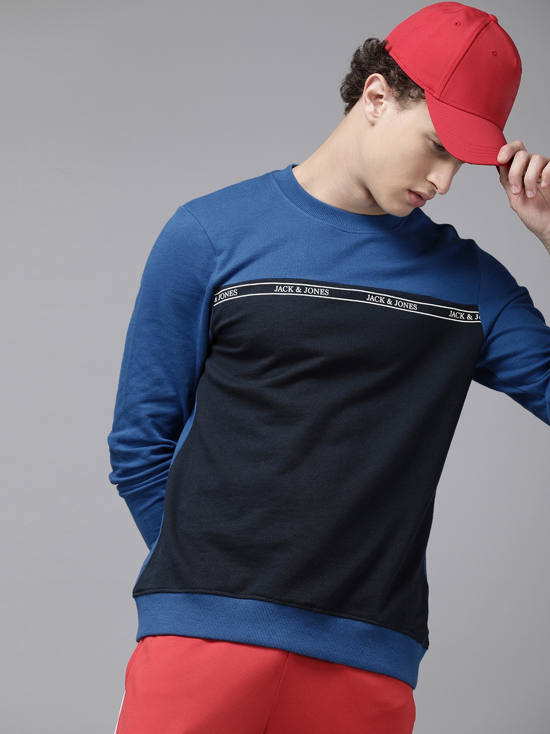 

Jack & Jones Men Blue & Black Colourblocked Sweatshirt