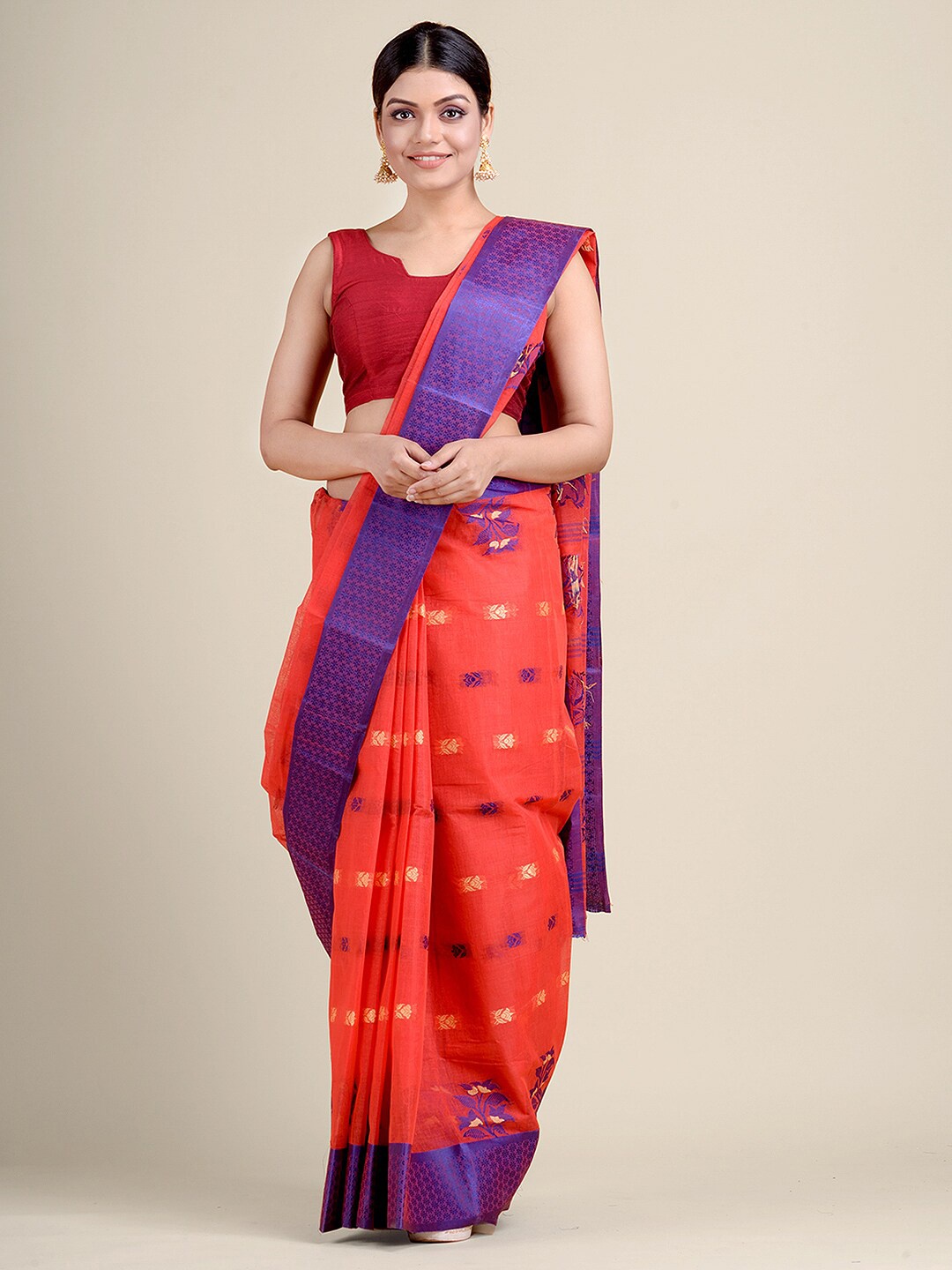 

Charukriti Red & Blue Ethnic Motifs Zari Pure Cotton Taant Saree