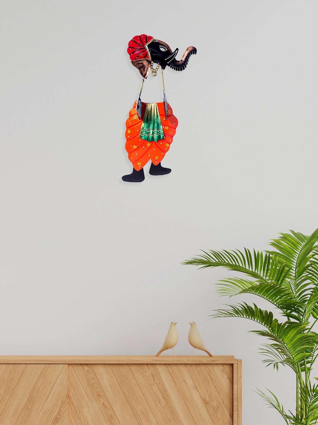 

Golden Peacock Orange & Black Lord Ganesha Playing Manjeera Wall Hanging Decor