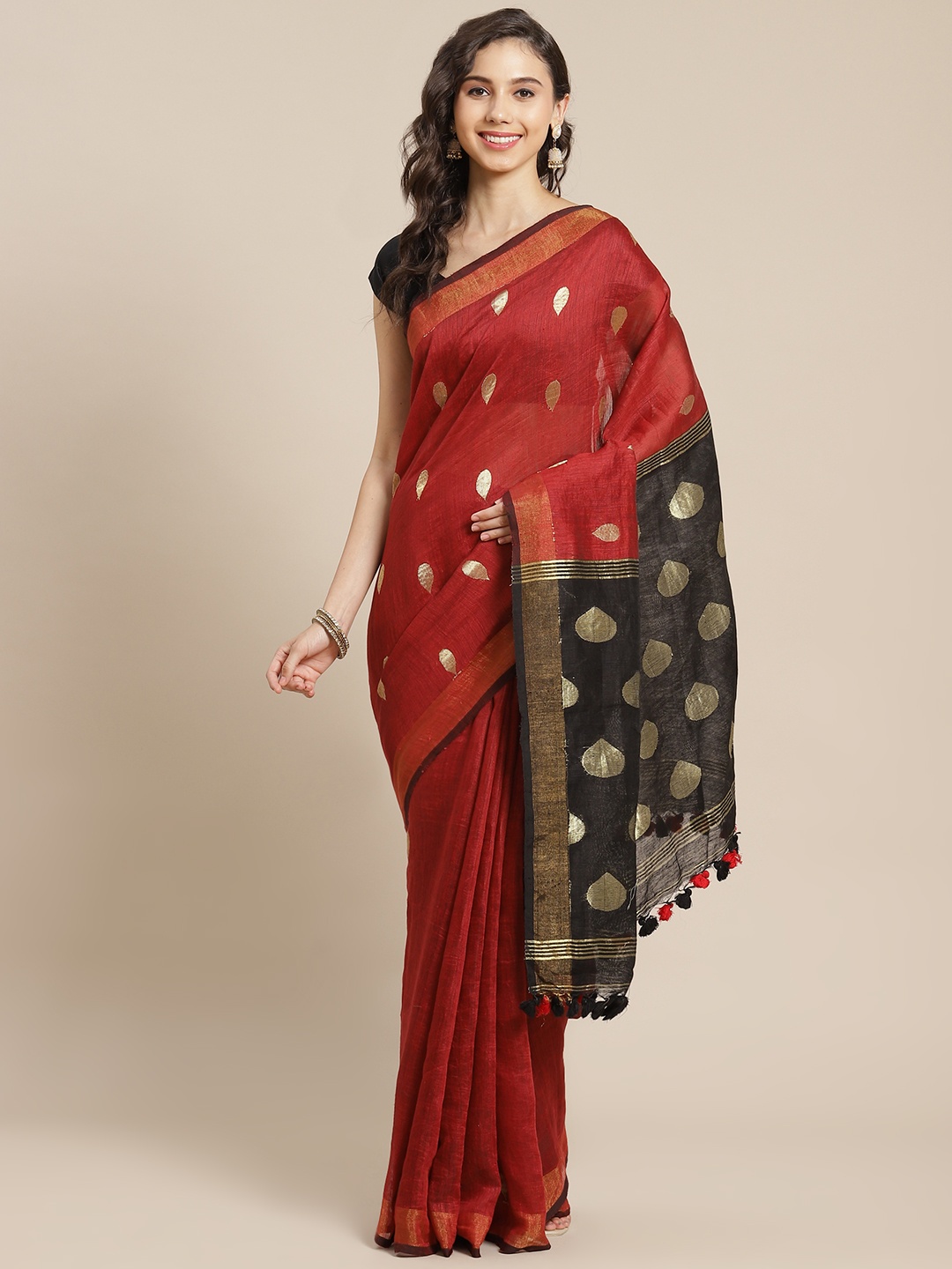 

ADITRI Maroon & Golden Ethnic Motifs Zari Handloom Saree