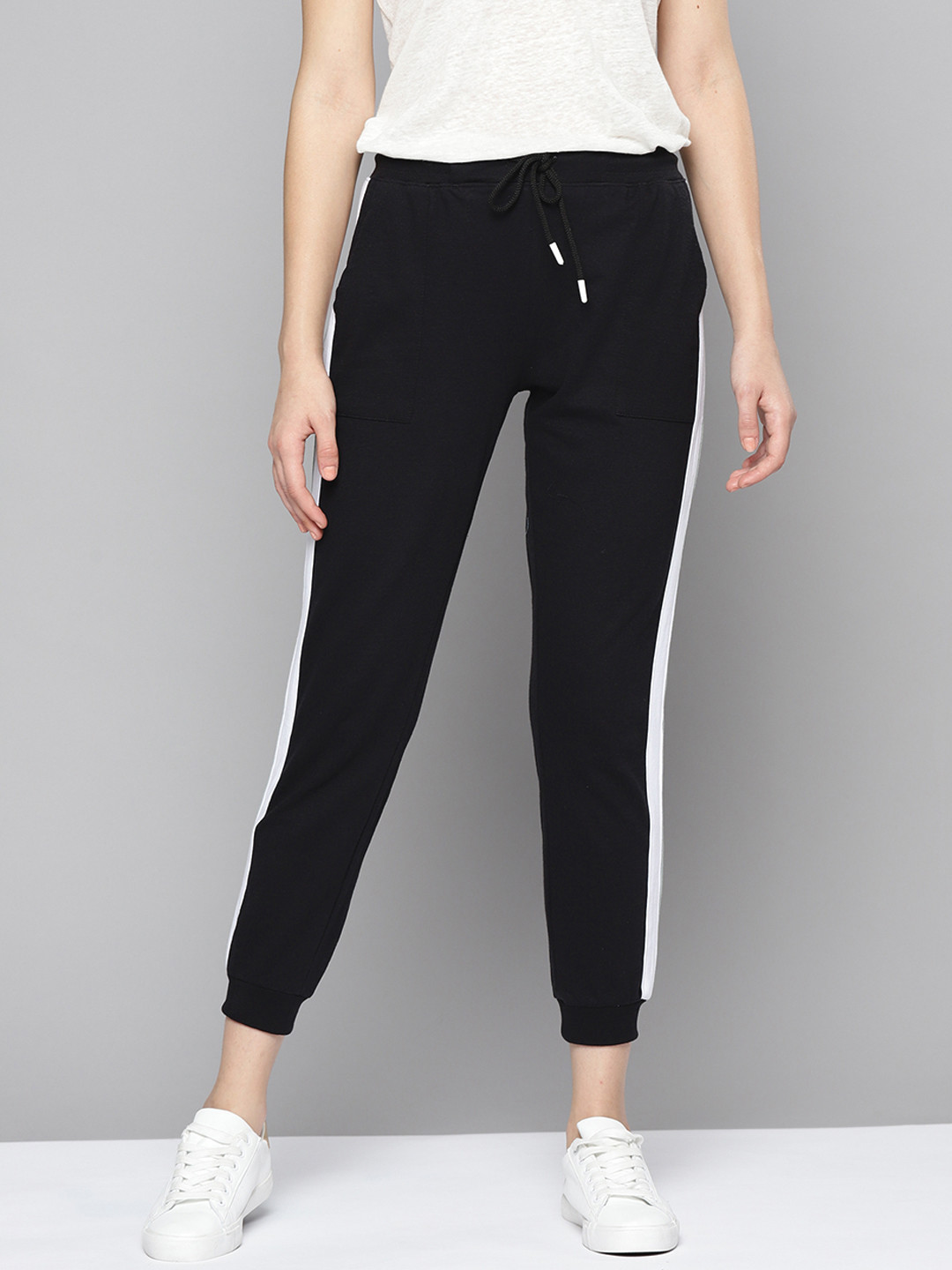 

Mast & Harbour Women Black Cotton Solid Cropped Joggers with Side Stripe Detail