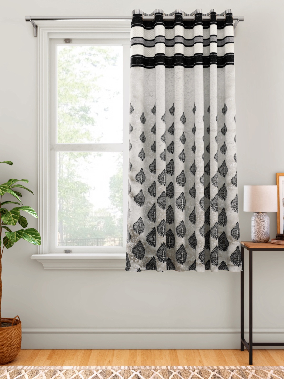 

Aura Off White & Black Ethnic Motifs Patterned Window Curtain