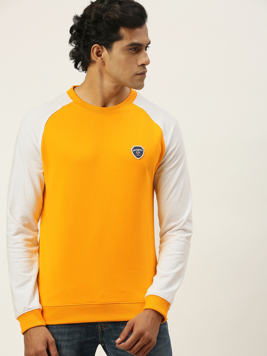 

PETER ENGLAND UNIVERSITY Men Yellow Self-design Applique Sweatshirt
