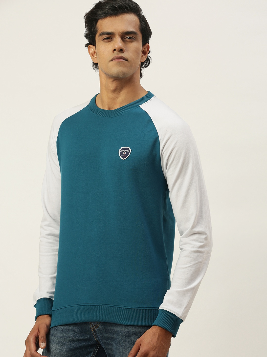 

PETER ENGLAND UNIVERSITY Men Teal Blue Self-Design Applique Sweatshirt