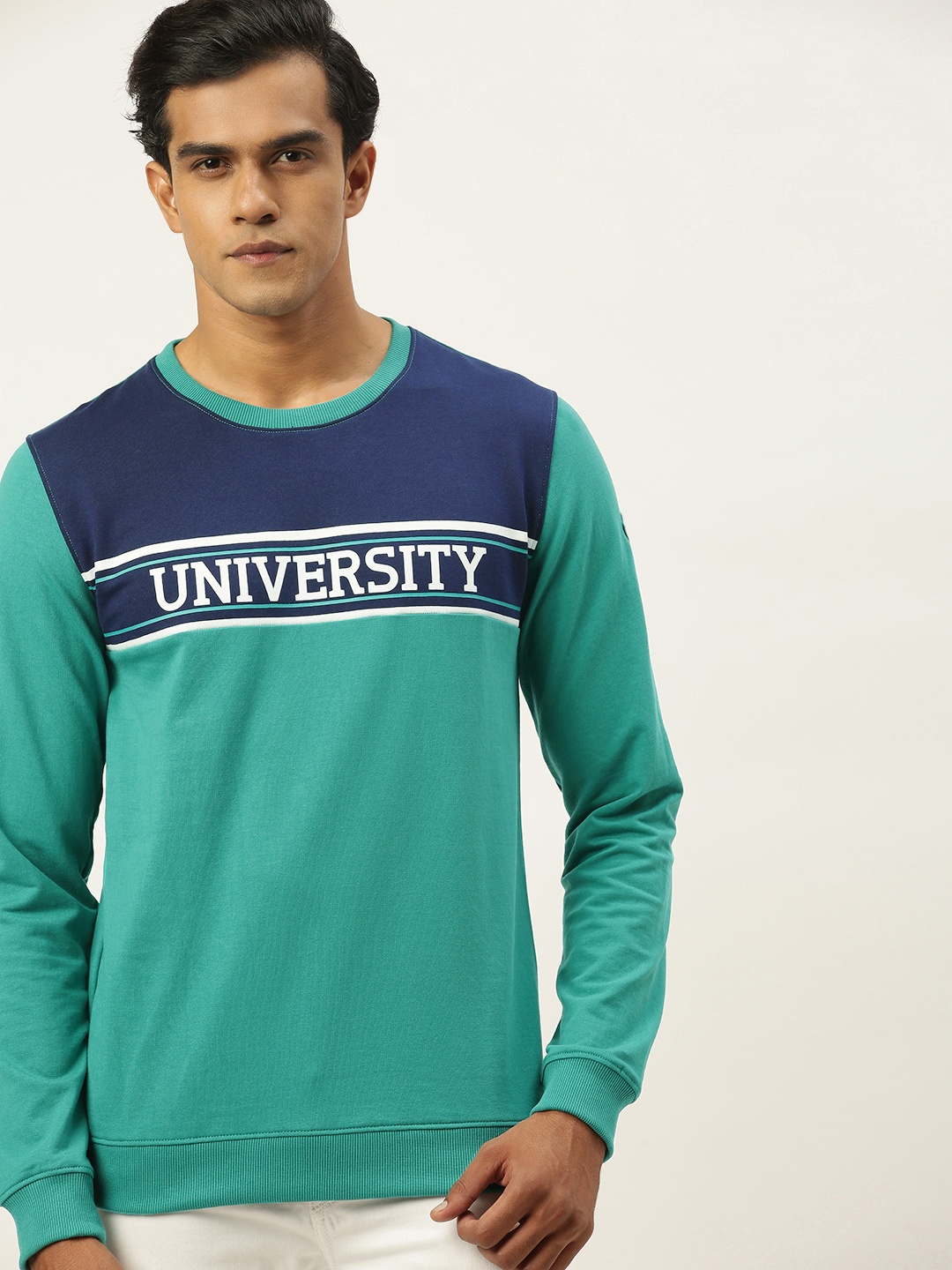

PETER ENGLAND UNIVERSITY Men Blue Super Slim Fit Colourblocked Sweatshirt