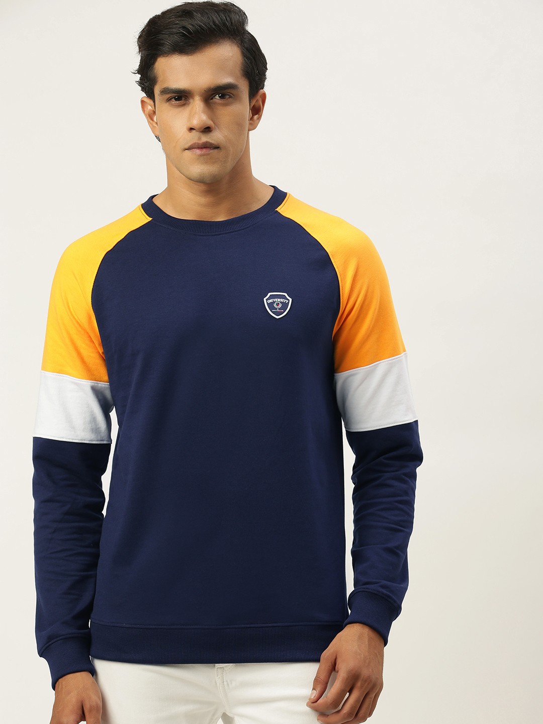 

PETER ENGLAND UNIVERSITY Men Navy Blue Self-design Applique Sweatshirt