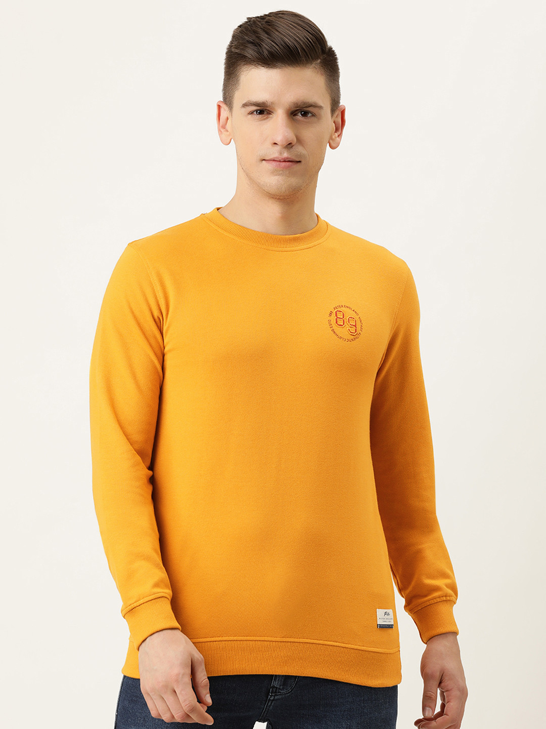 

Peter England Casuals Men Mustard Yellow Solid Sweatshirt