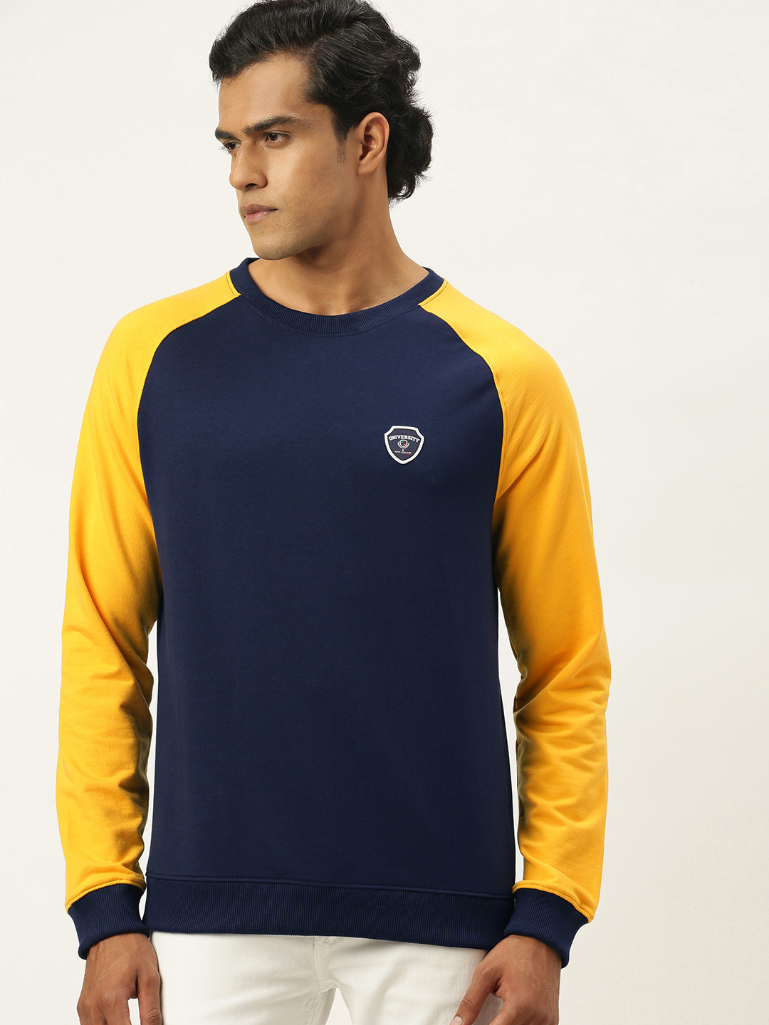 

PETER ENGLAND UNIVERSITY Men Navy Blue Self-design Applique Sweatshirt