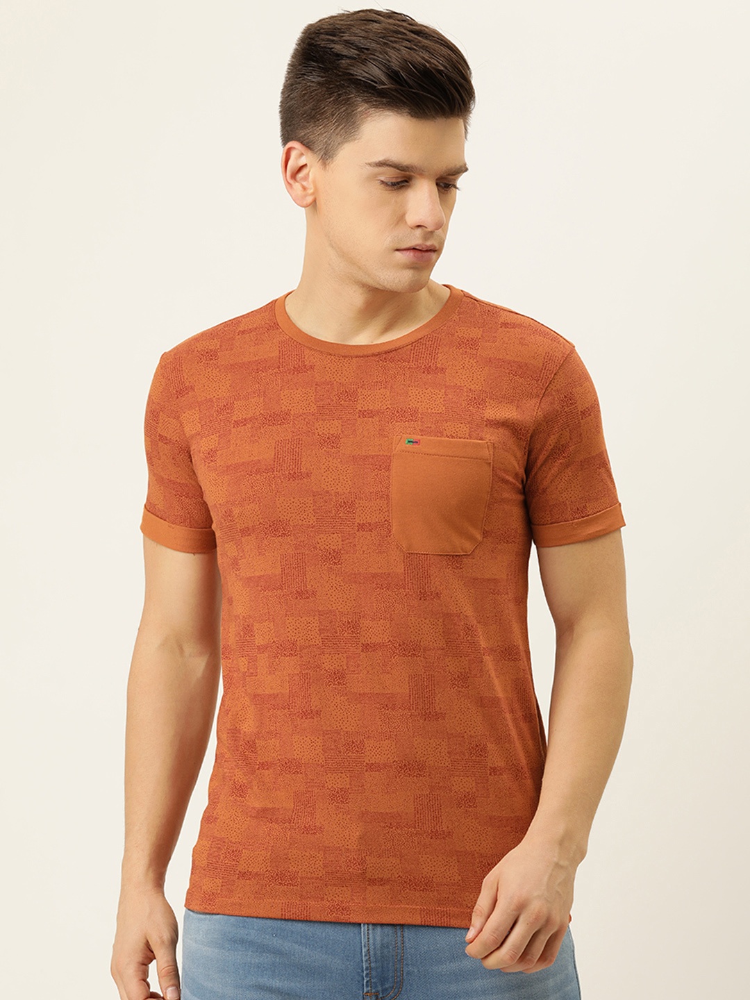 

Peter England Casuals Men Rust Printed T-shirt