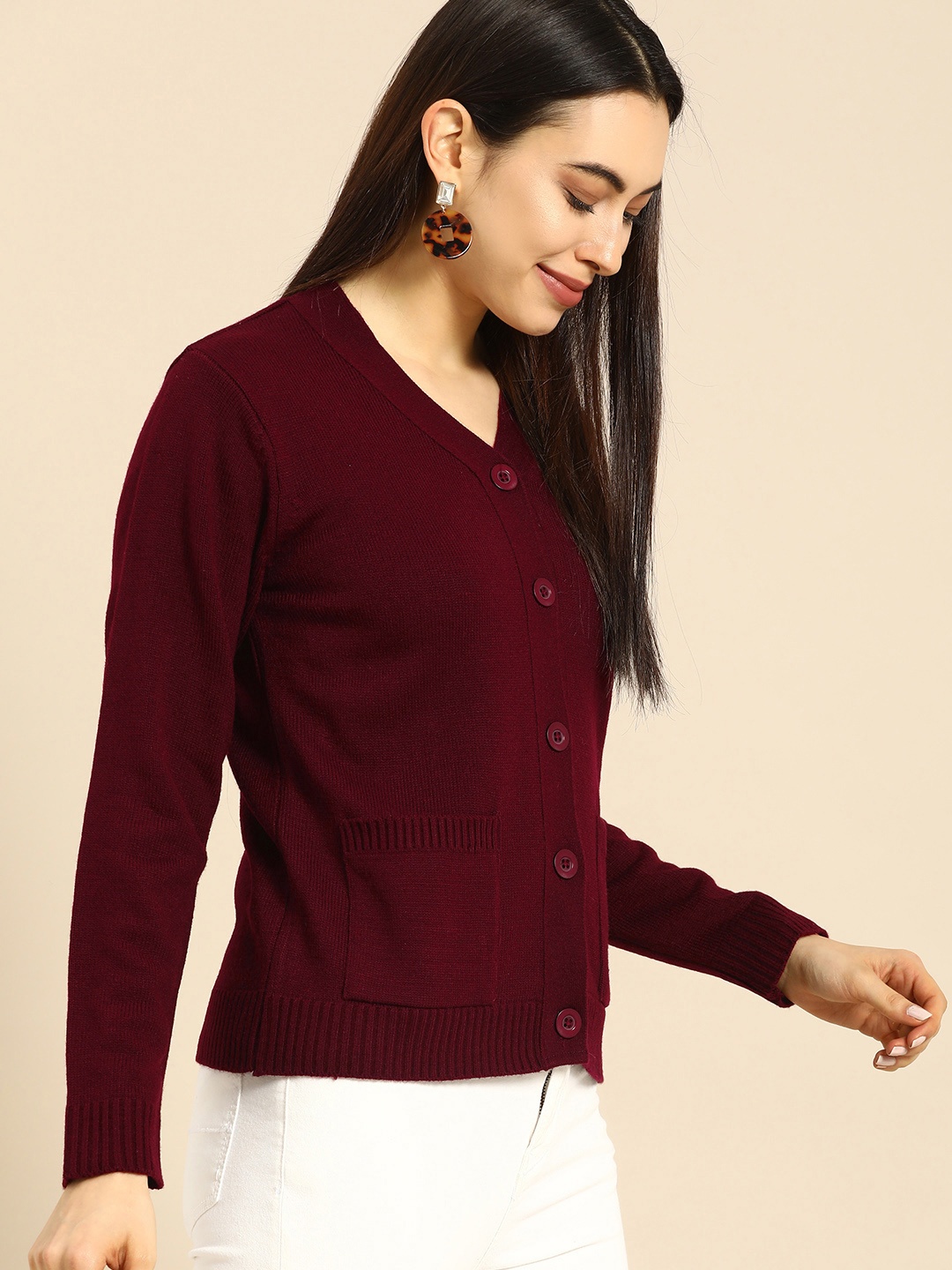 

Anouk Women Maroon Solid V Necked Sweater Vest