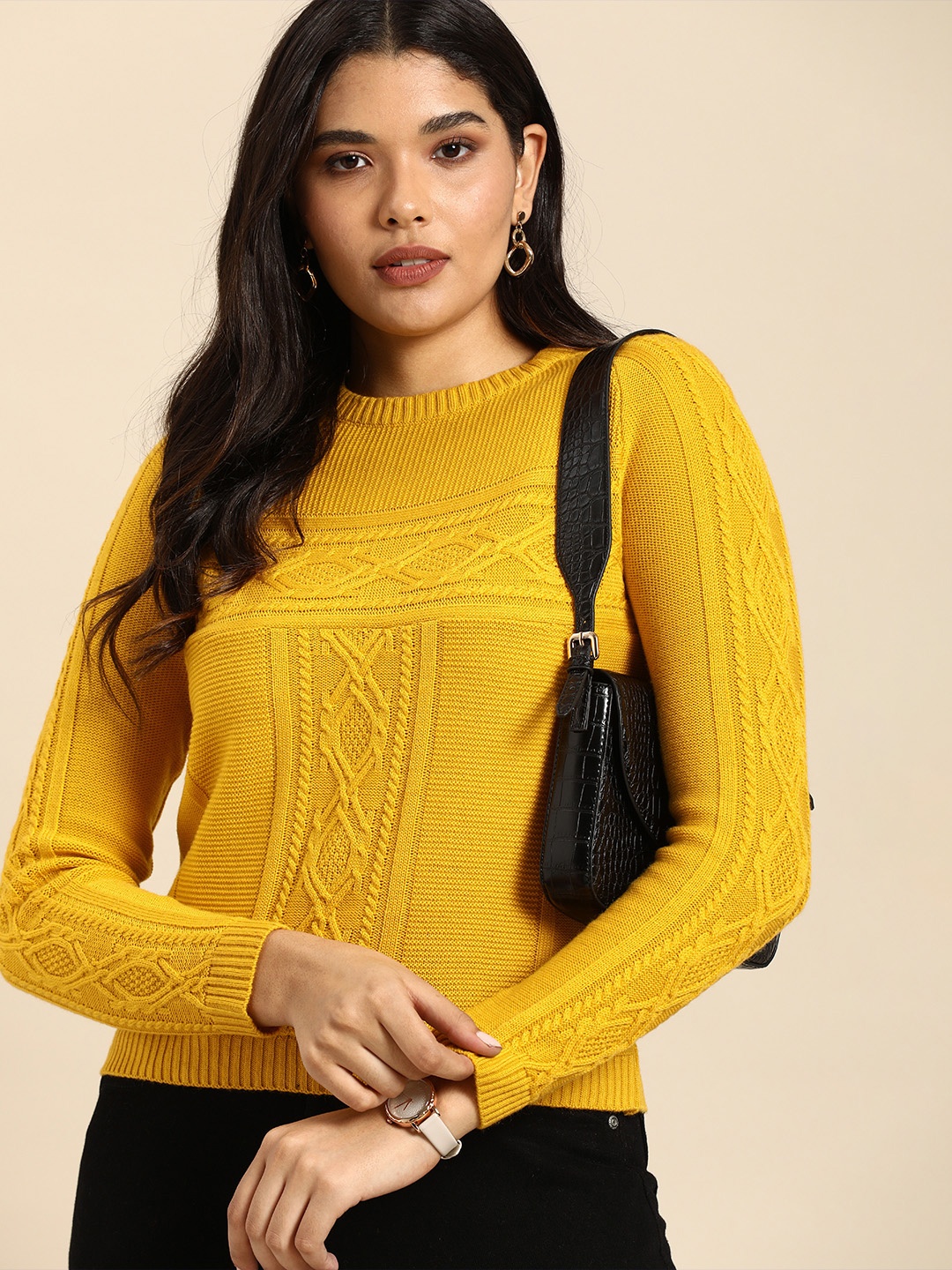 

Anouk Women Mustard Yellow Self-design Cable Knit Round Neck Winter Sweater