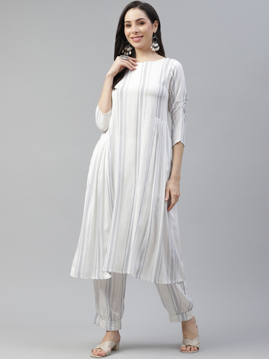 

Cottinfab Women White & Grey Striped Kurta with Trousers