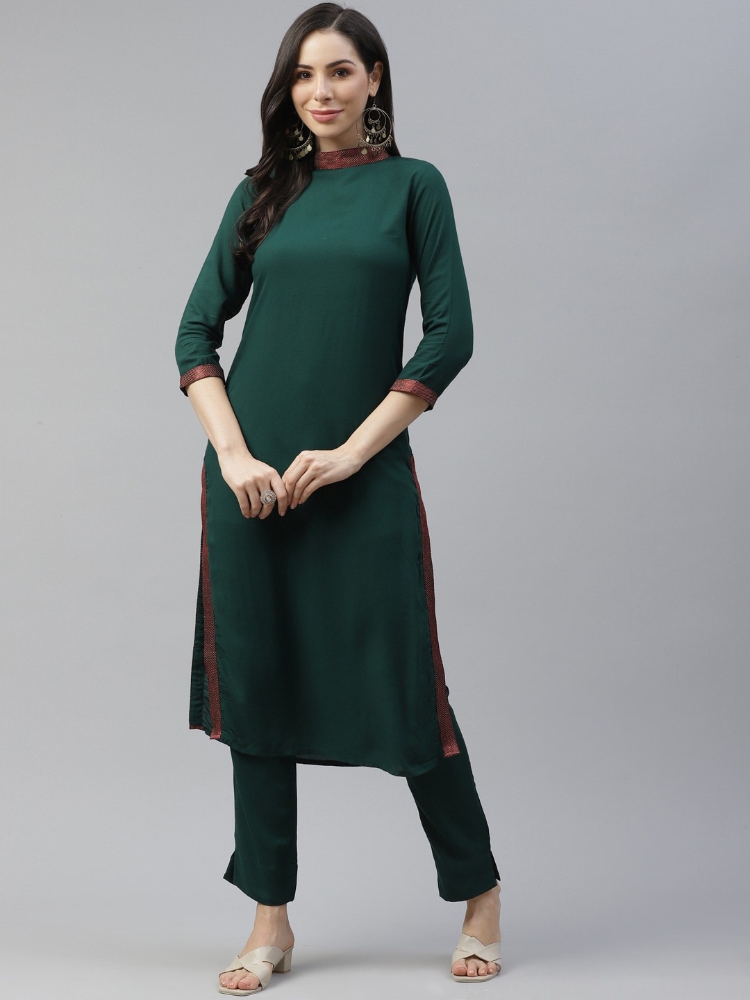 

Cottinfab Women Green Kurta with Trousers
