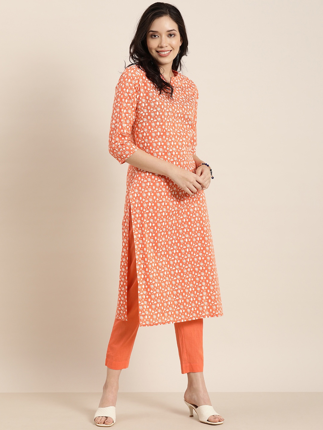 

Sangria Women Orange & White Printed Regular Pure Cotton Kurta with Trousers