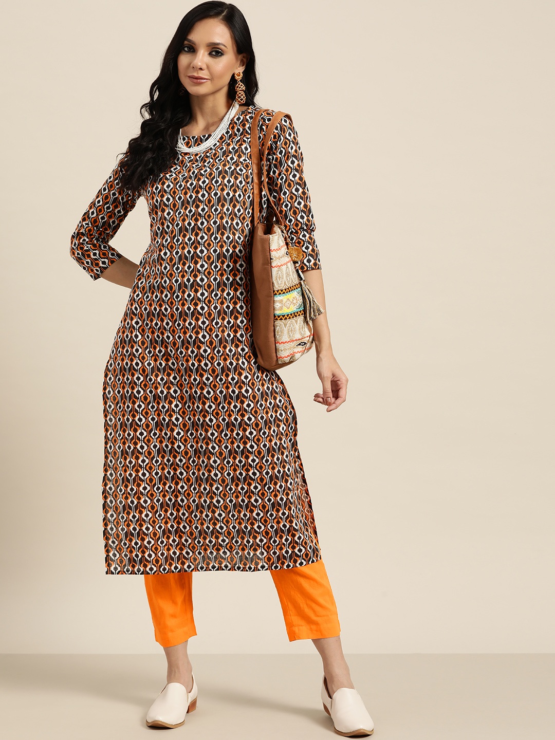 

Sangria Women Black & Orange Printed Regular Pure Cotton Kurta with Trousers