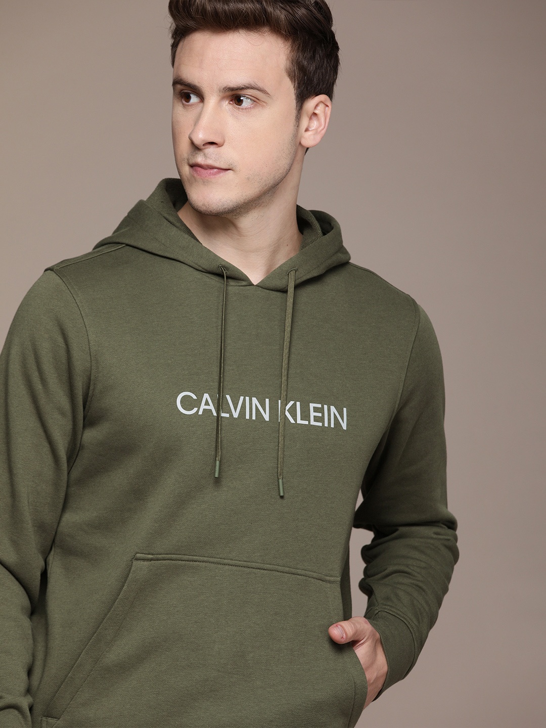 

Calvin Klein Jeans Men Olive Green Printed Hooded Sweatshirt