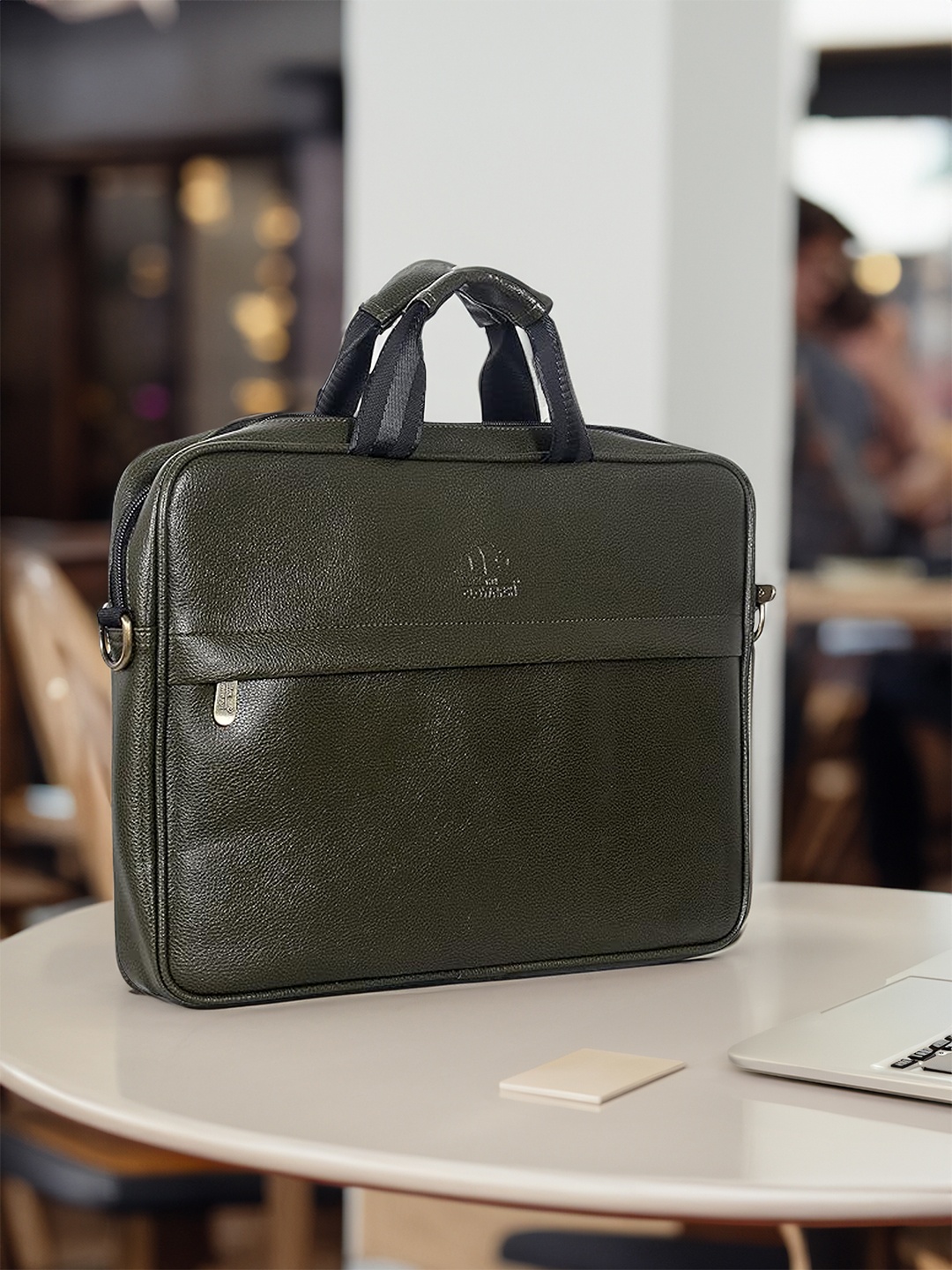 

THE CLOWNFISH Unisex Green Leather Laptop Bag