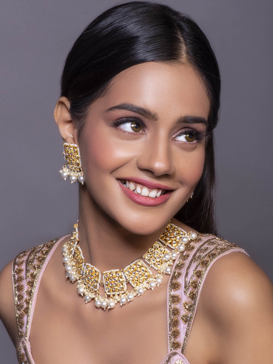 

Fida Gold-Plated White Kundan-Studded & Pearl Beaded Handmade Jewellery Set