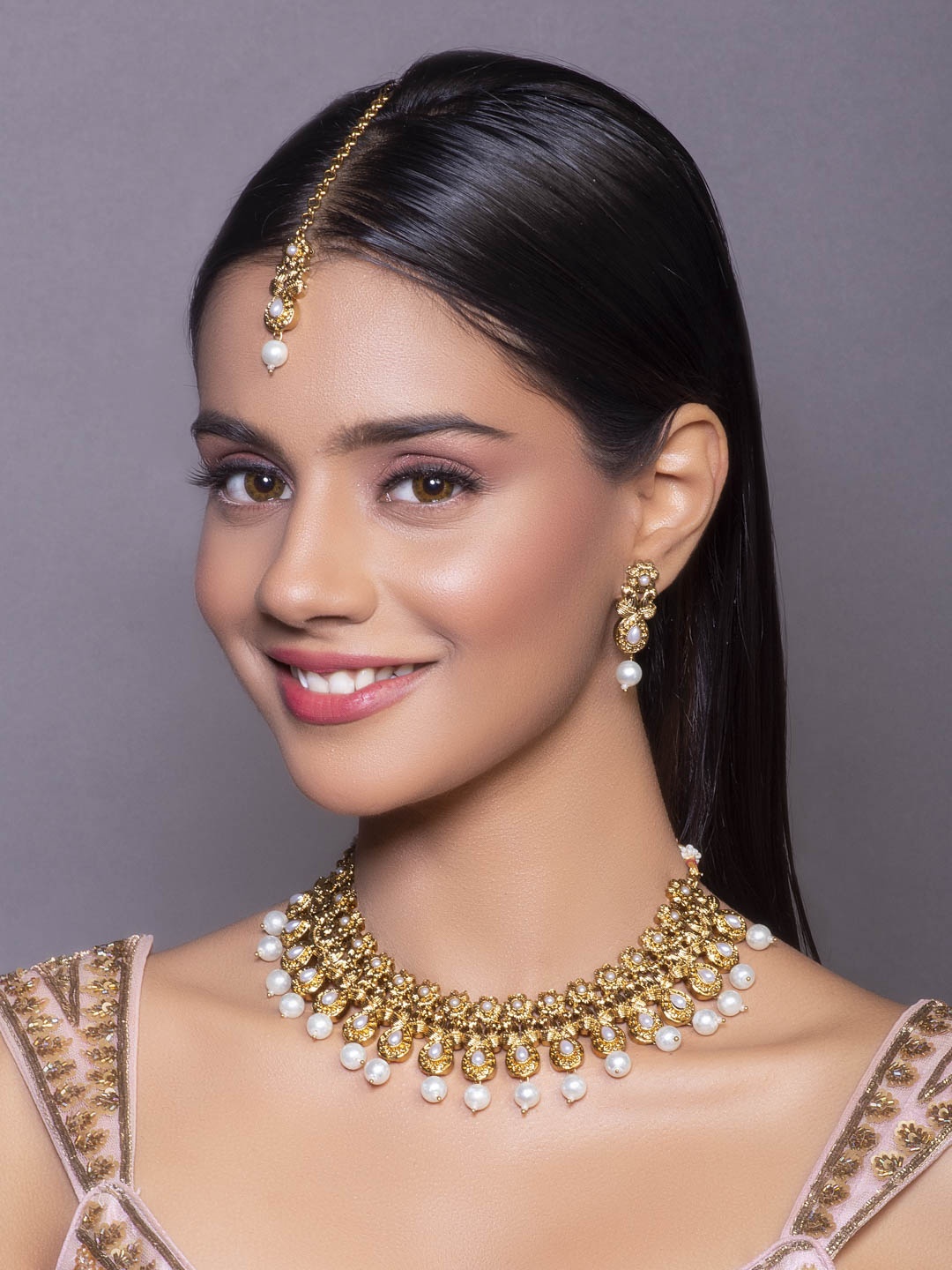 

Fida Gold-Plated White Pearl Studded & Beaded Jewellery Set