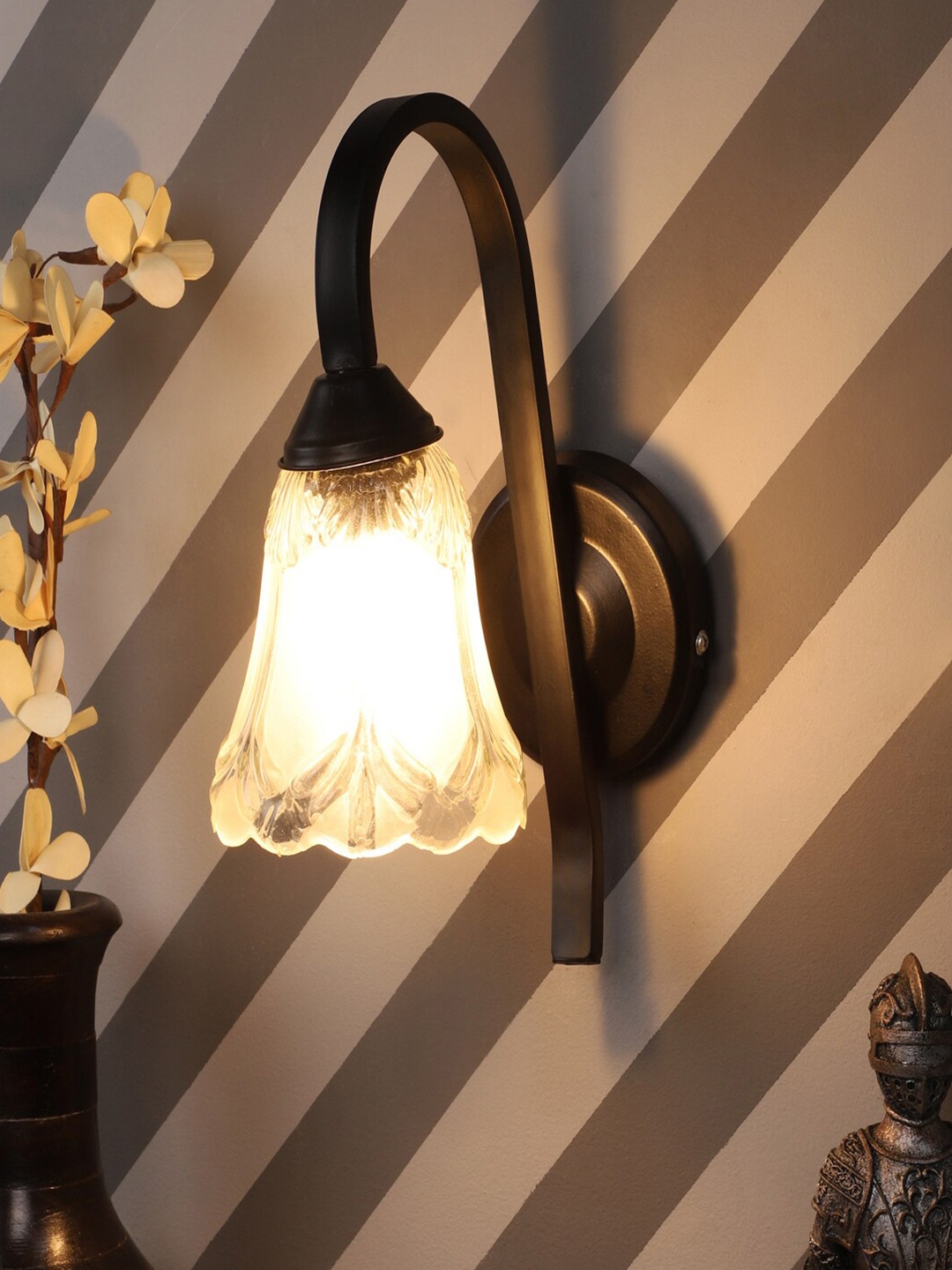 

MFD HOME FURNISHING Transparent & Black Glass Contemporary China Bell Armed Sconce