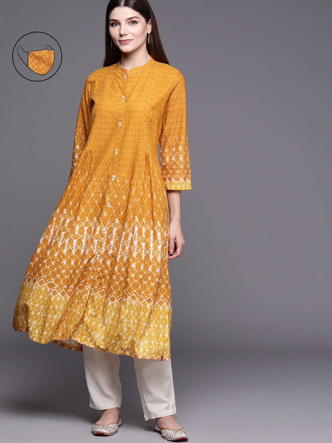 

Biba Women Mustard Yellow & White Geometric Dyed Gathered A-line Kurta with Mask
