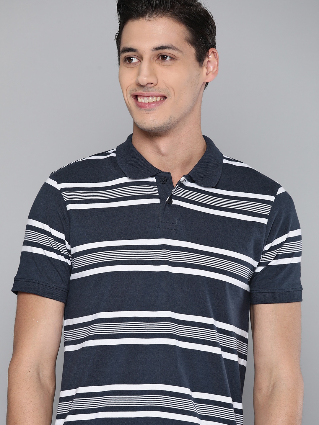 

Mast & Harbour Men Navy Blue & White Striped Pure Cotton Polo Collar T-shirt