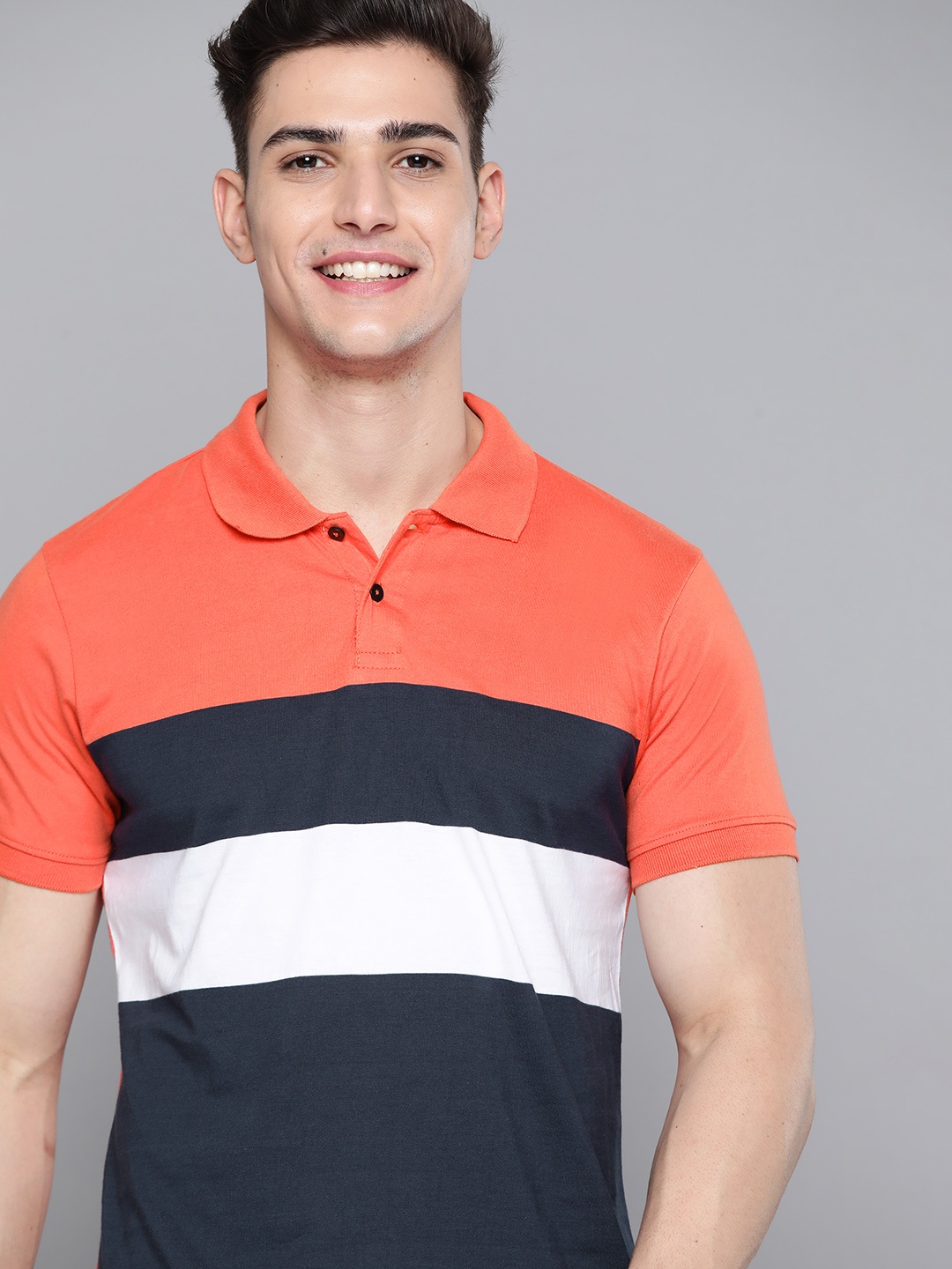 

Mast & Harbour Men Navy Blue & Coral Orange Colourblocked Pure Cotton Polo Collar T-shirt