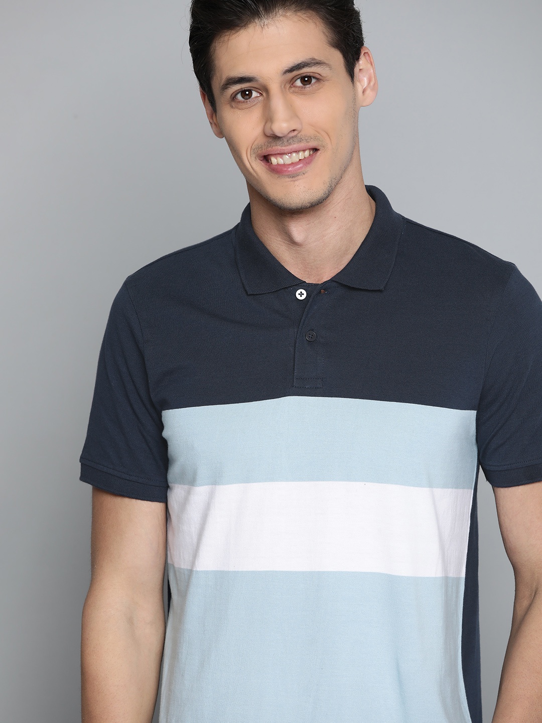 

Mast & Harbour Men Navy Blue & White Colourblocked Pure Cotton Polo Collar T-shirt