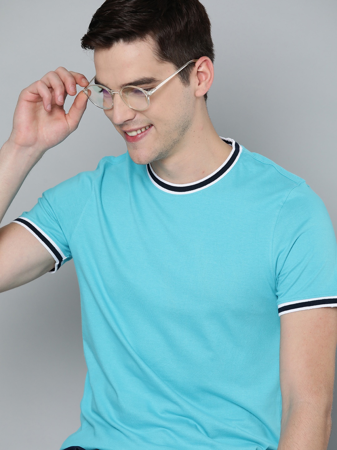 

Mast & Harbour Men Blue Solid Handcrafted T-shirt