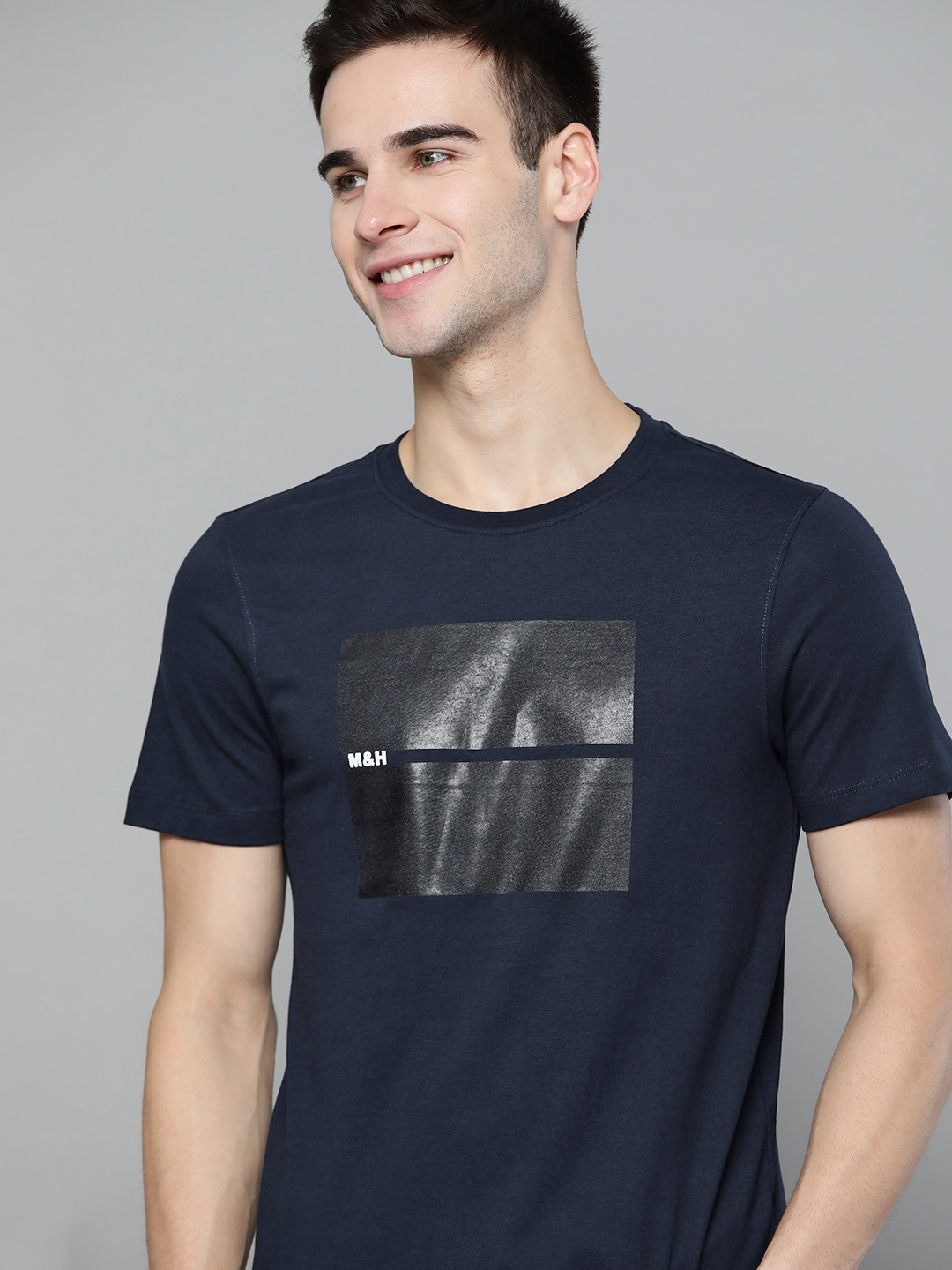 

Mast & Harbour Men Navy Blue & Black Pure Cotton Brand Logo Printed T-shirt