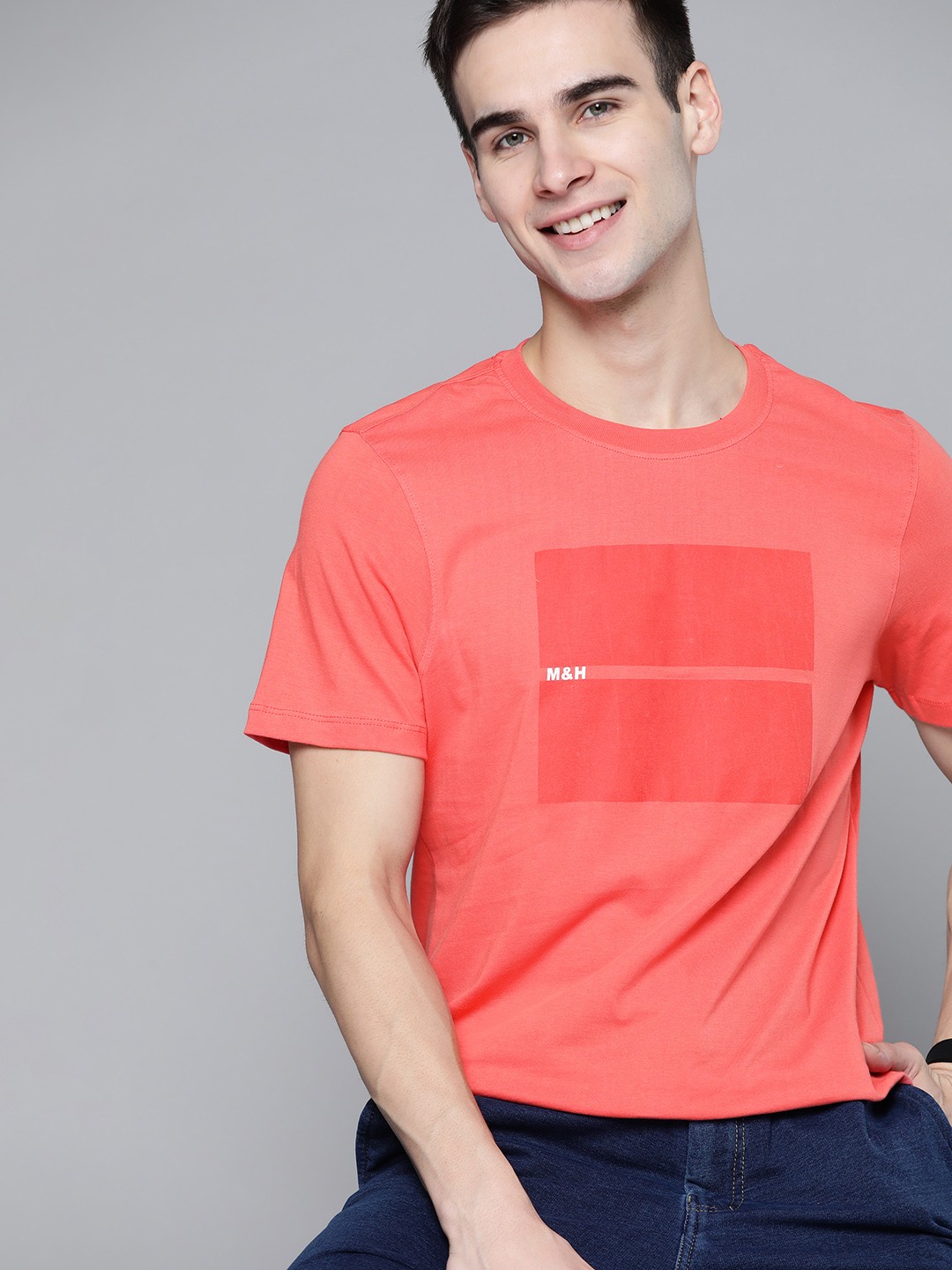 

Mast & Harbour Men Coral Red Pure Cotton Brand Logo Printed T-shirt