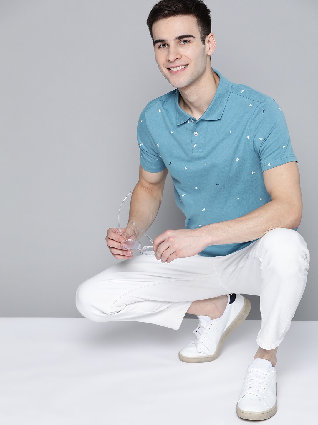 

Mast & Harbour Men Blue & White Printed Pure Cotton Polo Collar T-shirt