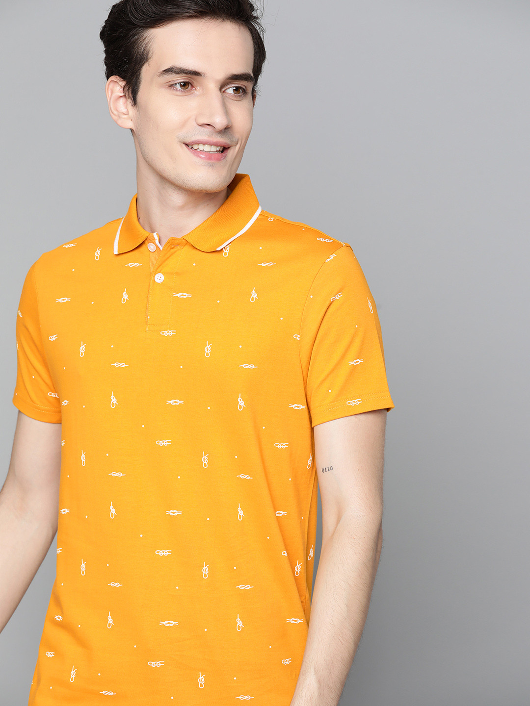 

Mast Harbour Men Mustard Yellow Off-White Pure Cotton Printed Polo Collar Pure Cotton T-shirt