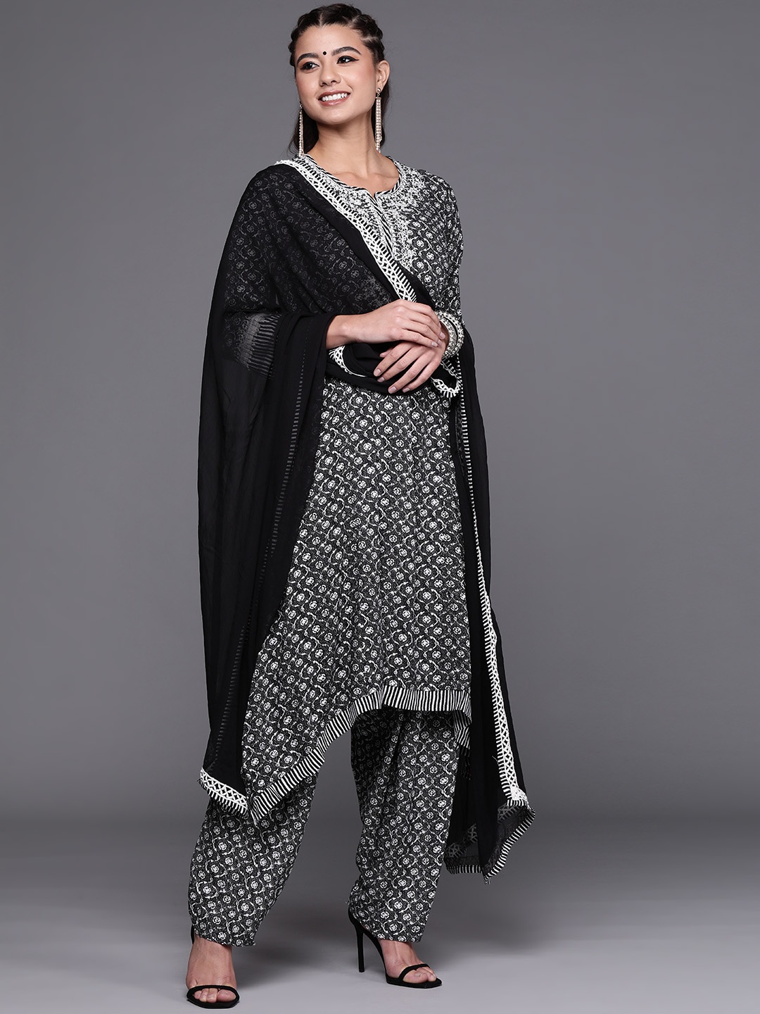 

Biba Women Black & White Motifs Print Kurta with Salwar & Dupatta