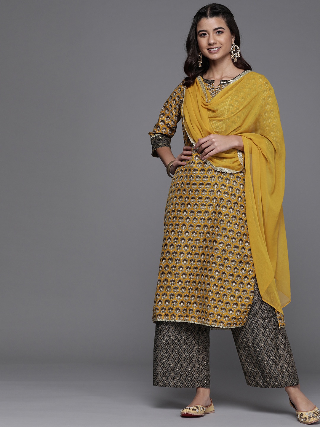 

Biba Women Yellow Floral Printed Regular Kurta with Palazzos & With Dupatta