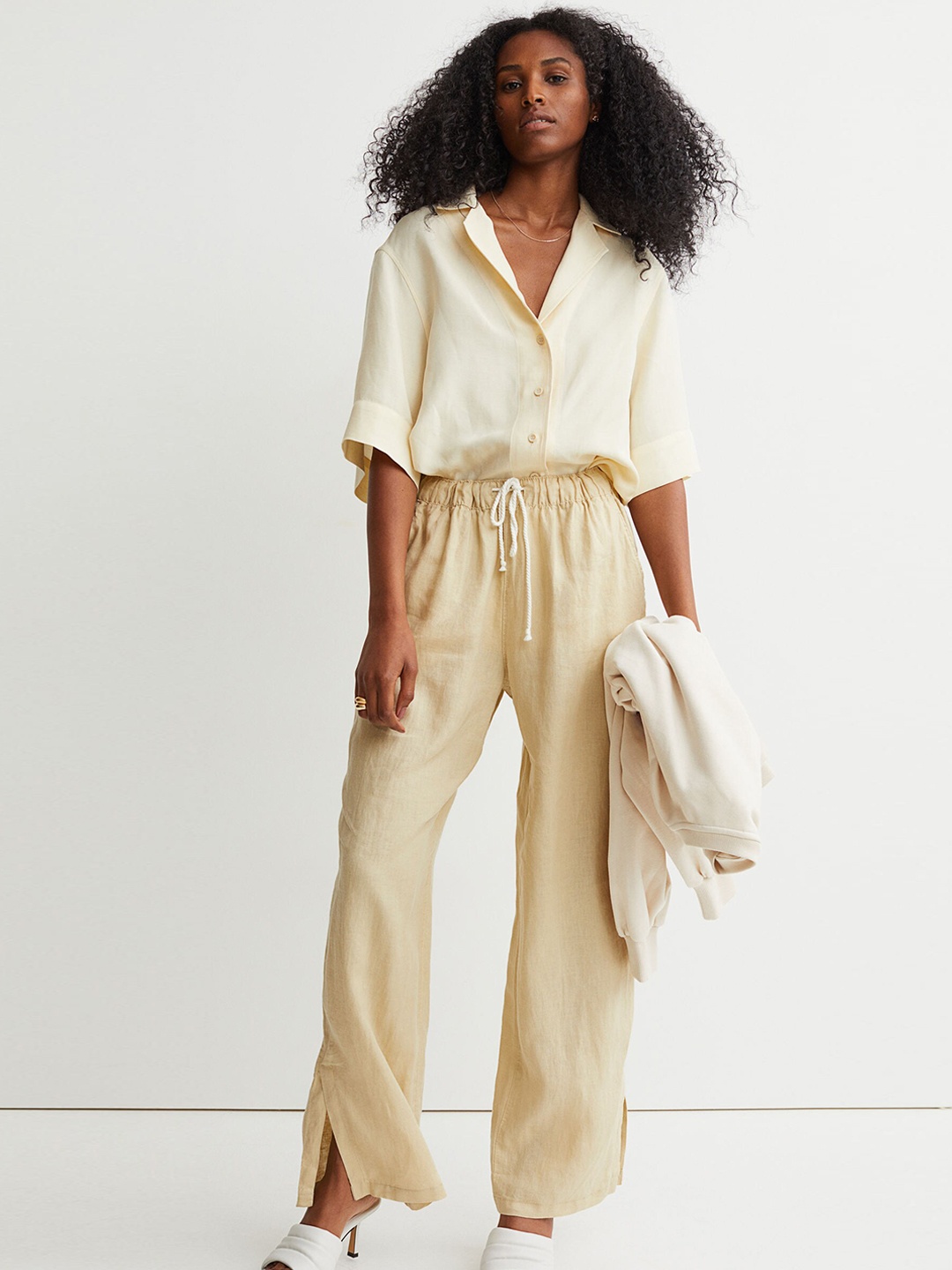 

H&M Women Solid Yellow Linen Trousers