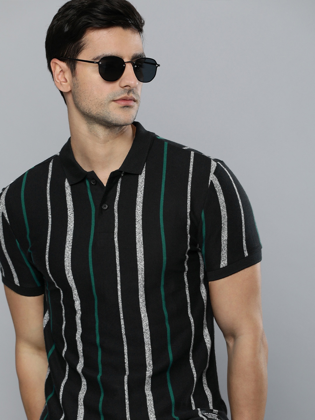 

Levis Men Black Striped Polo Collar Pure Cotton Casual T-shirt