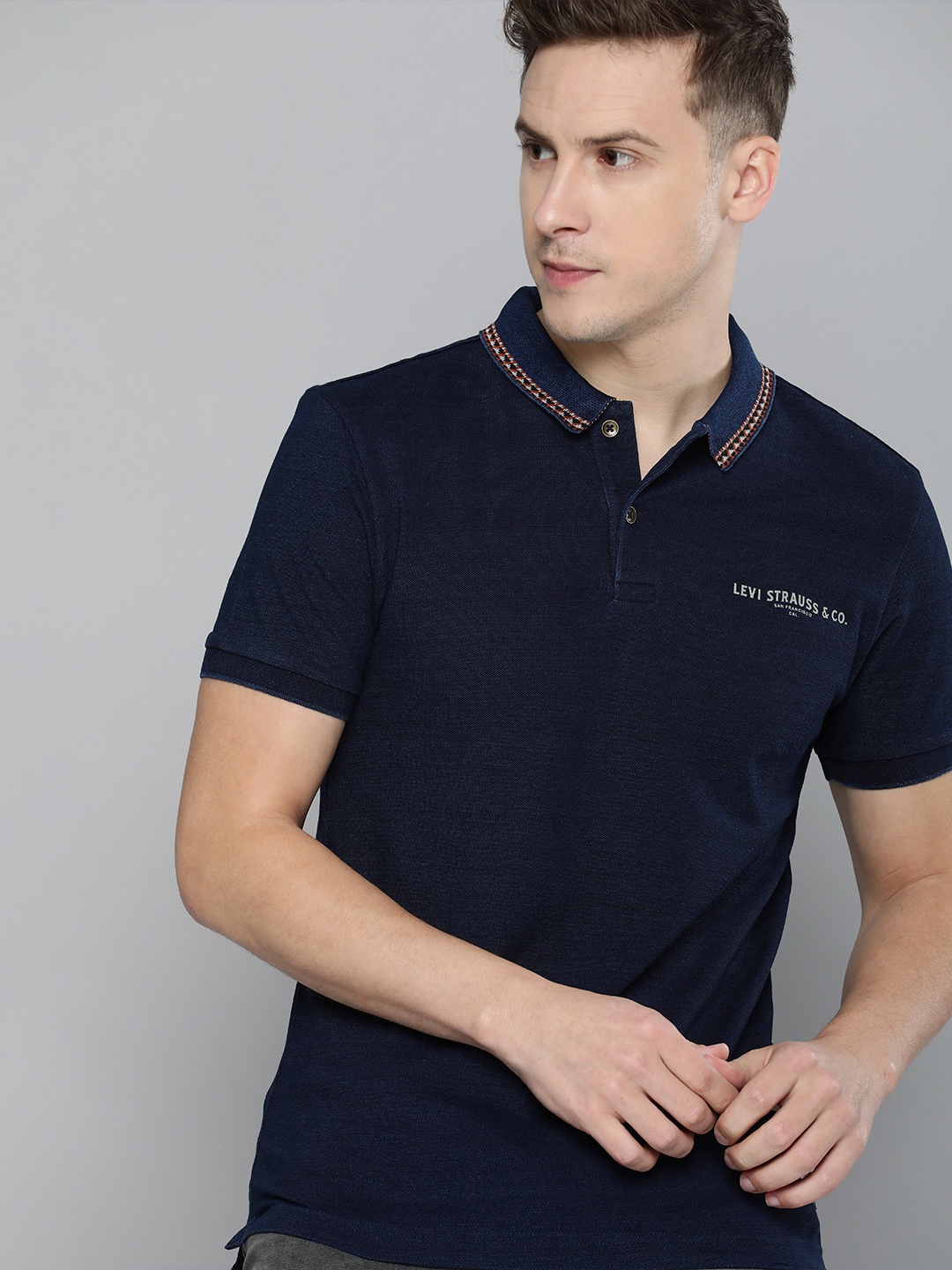 

Levis Men Navy Blue Brand Logo Printed Polo Collar Pure Cotton T-shirt