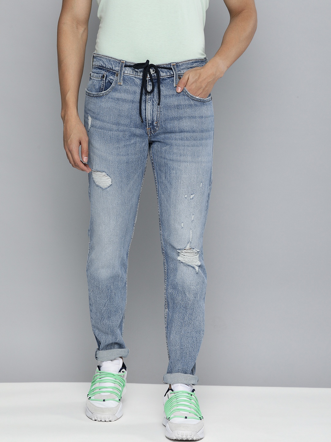 

Levis Men Blue 512 Slim Tapered Fit Mildly Distressed Light Fade Stretchable Jeans