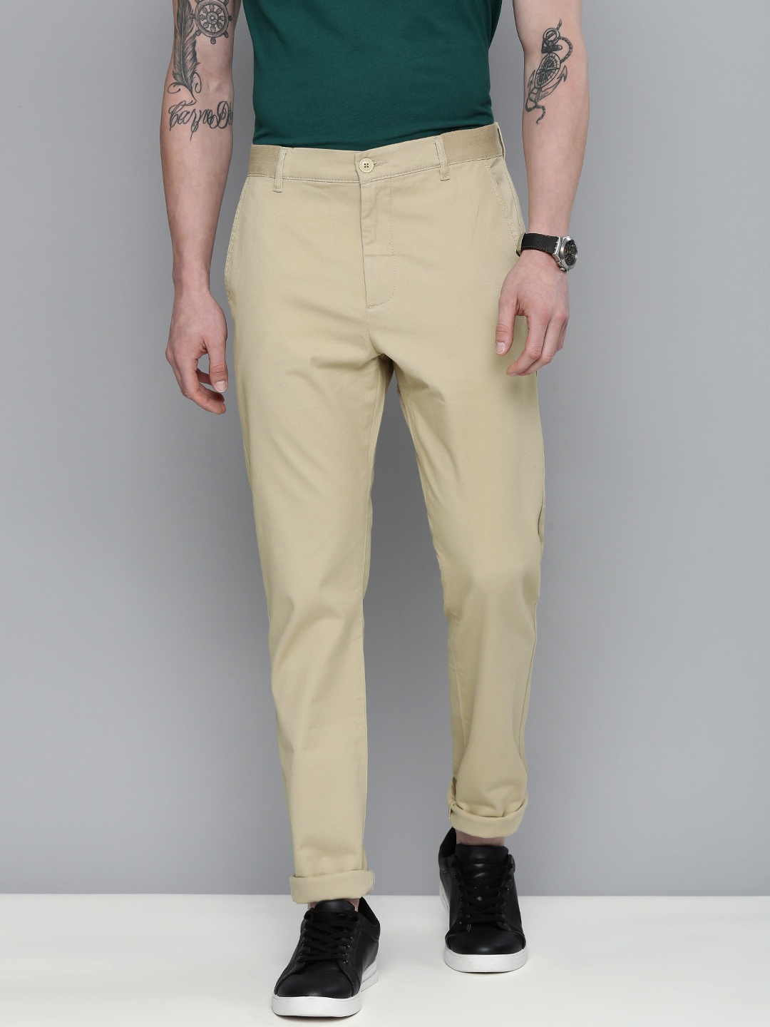 

Levis Men Light Beige Solid Slim Fit Chinos Trousers