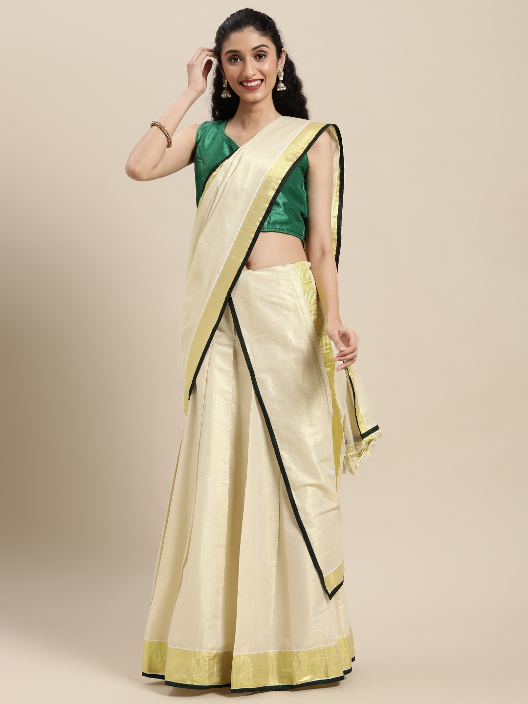 

Thara Sarees Off White Zari Kasavu Lehenga Saree
