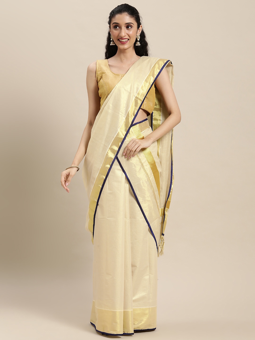 

Thara Sarees Off White Ethnic Motifs Kasavu Lehenga Saree